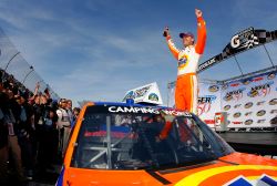 Kevin Harvick celebrates winning the Kroger 250 at Martinsville Speedway, his fourth consecutive victory in the NASCAR Camping World Truck Series Credit: Jason Smith/Getty Images for NASCAR